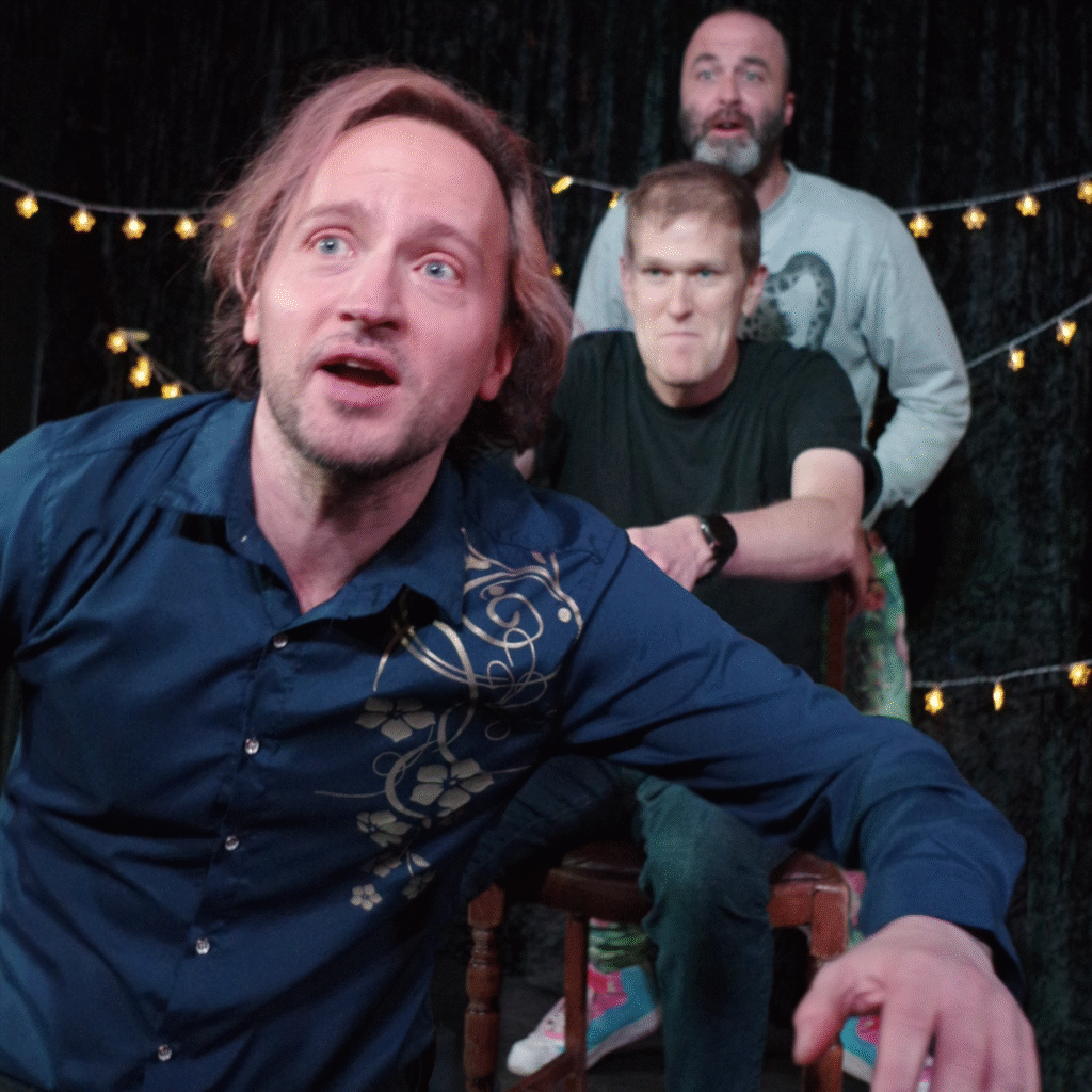 Scoops performers, Simon, Ben and Ric on the stage performing improv at the Actors in Brighton