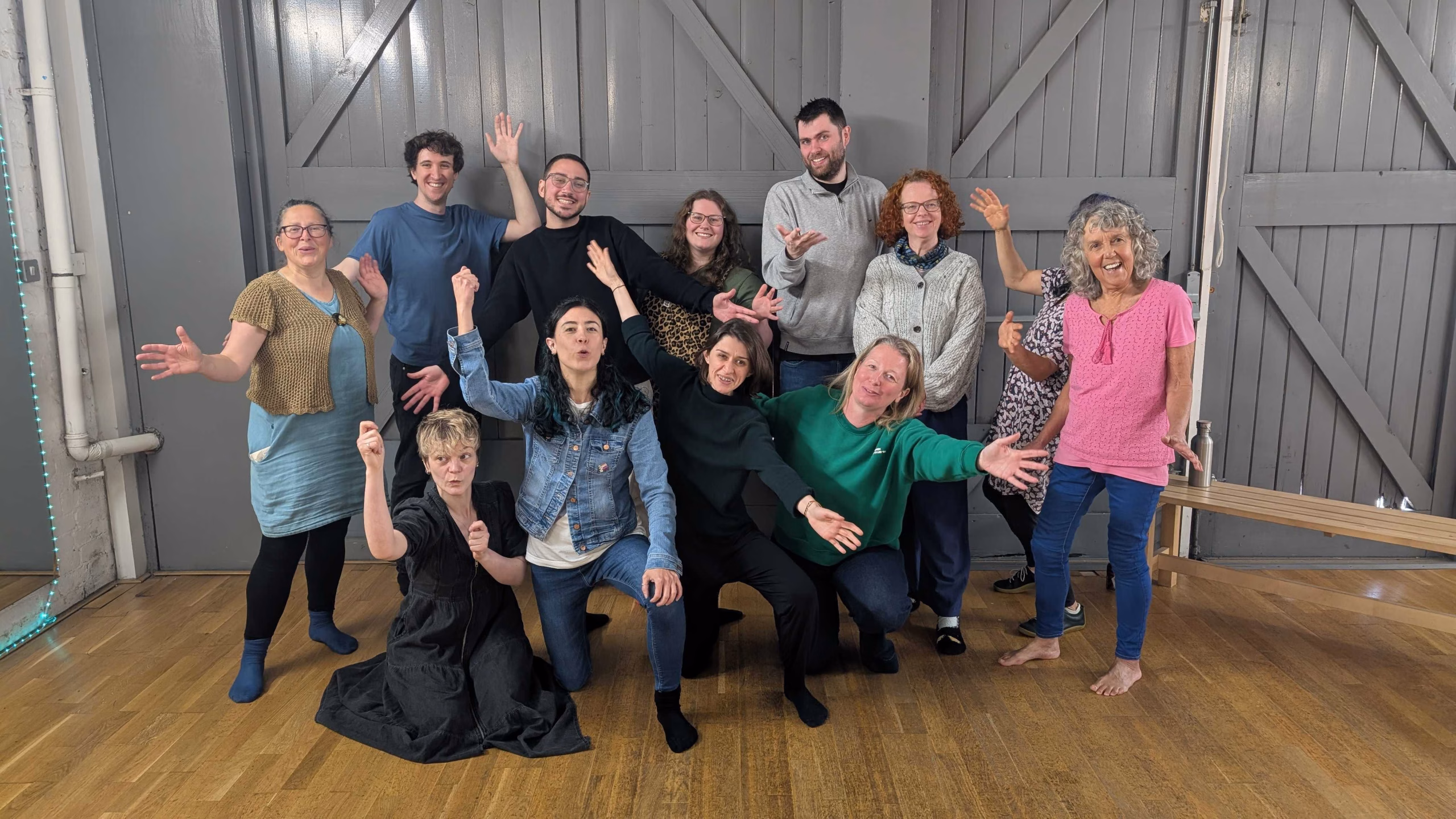 12 musical improvisers pose for a class selfie after an AndAlso musical drop-in